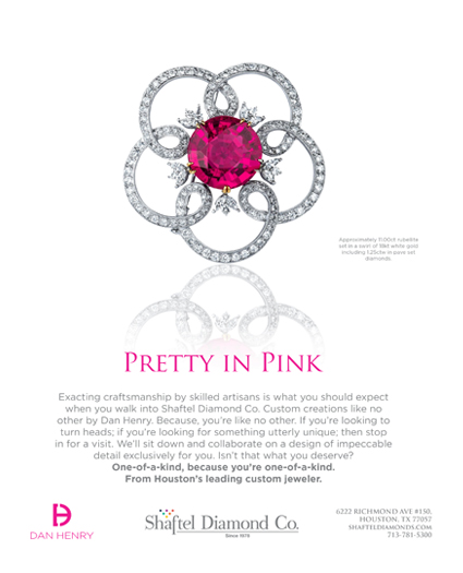 a brochure with a pink stone in the center