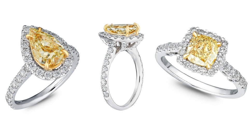 three engagement rings with yellow and white diamonds