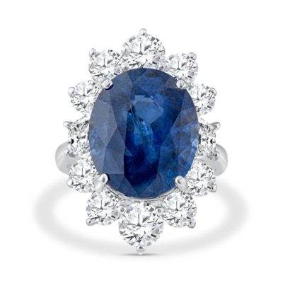 a blue and white ring with diamonds around it