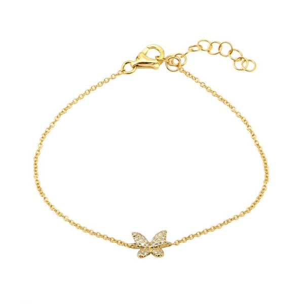 a gold bracelet with a butterfly charm