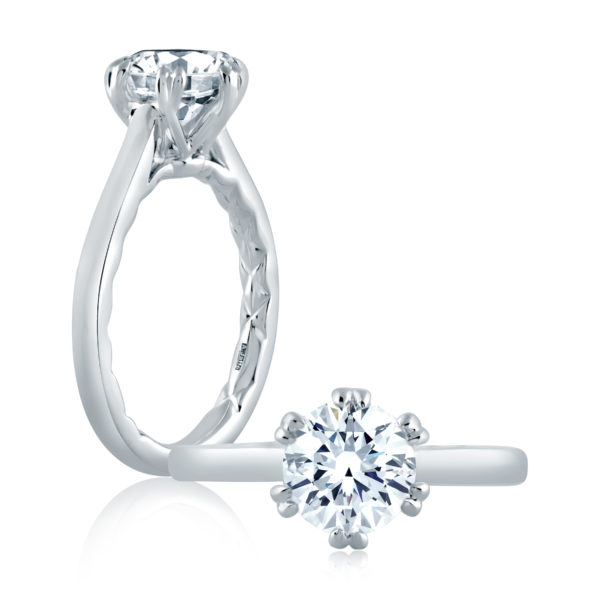a white gold engagement ring with a diamond
