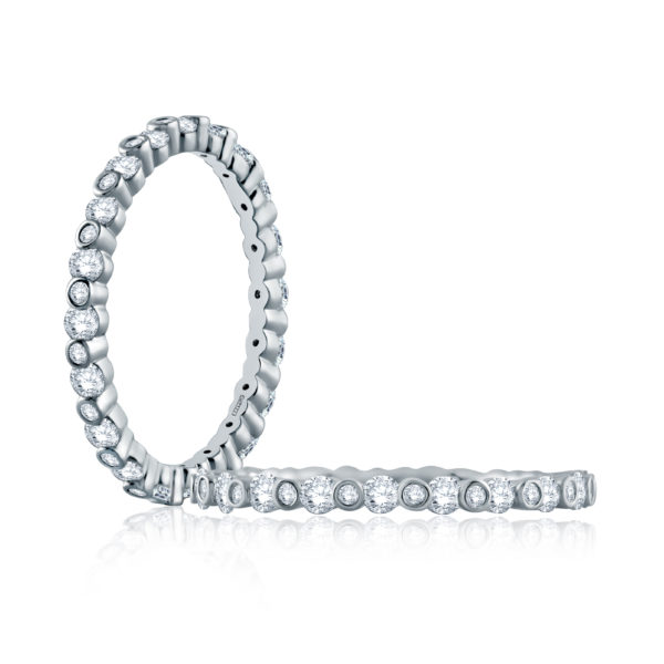 a white gold ring with round diamonds