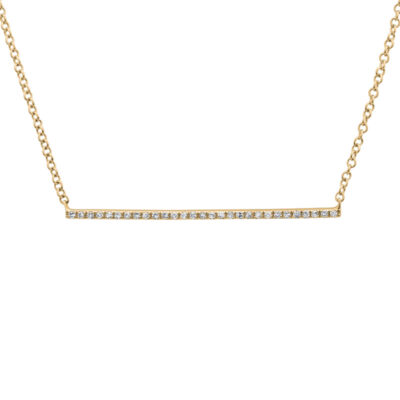 a diamond bar necklace on a gold chain