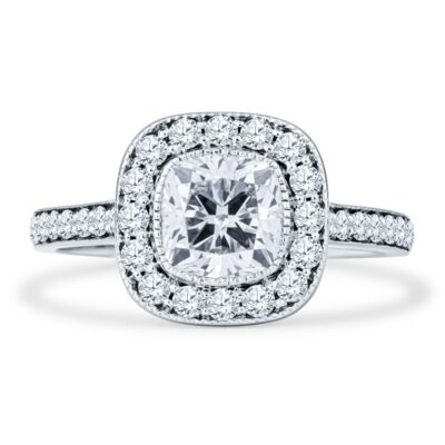 a cushion cut diamond ring with pave set shoulders