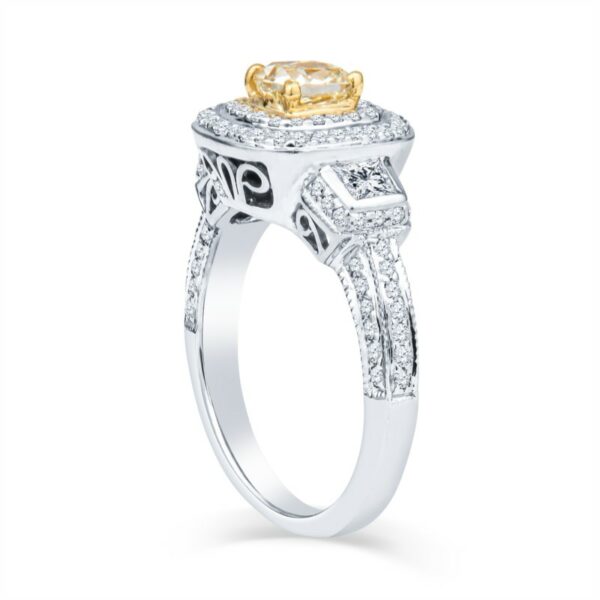 a yellow and white diamond engagement ring