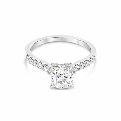 a cushion cut diamond engagement ring with side stones