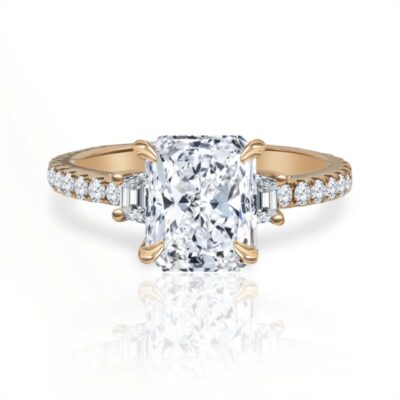 a cushion cut diamond ring with side stones