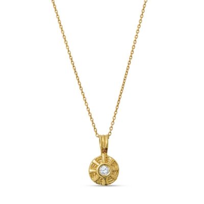 a gold necklace with a diamond on it