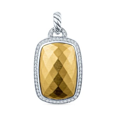 a yellow and white gold pendant with diamonds