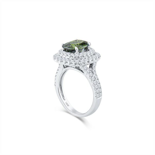 a ring with a green diamond and white diamonds
