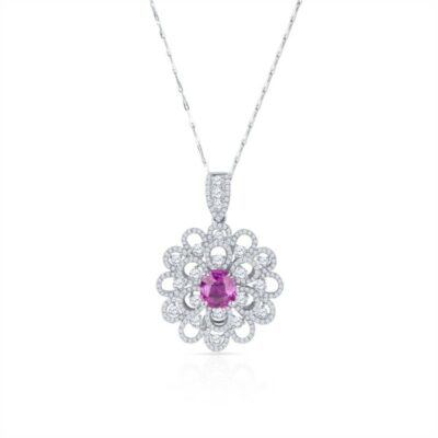 a necklace with a pink stone and white diamonds
