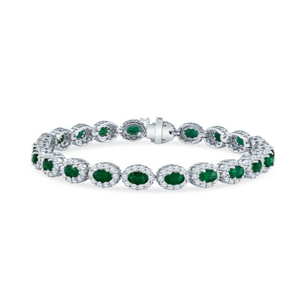 a bracelet with oval cut emeralds and diamonds