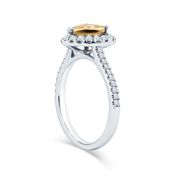 a yellow and white diamond engagement ring