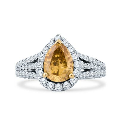 a fancy yellow diamond ring set in 18k white gold
