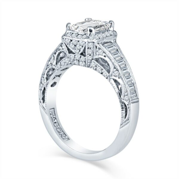 a white gold engagement ring with an intricate design