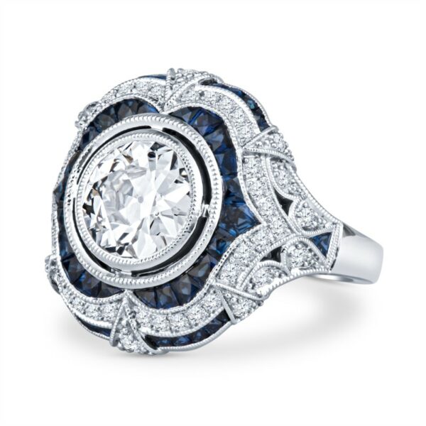 a fancy ring with blue and white diamonds