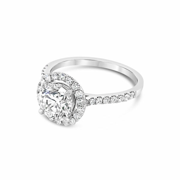 a white gold ring with a diamond halo