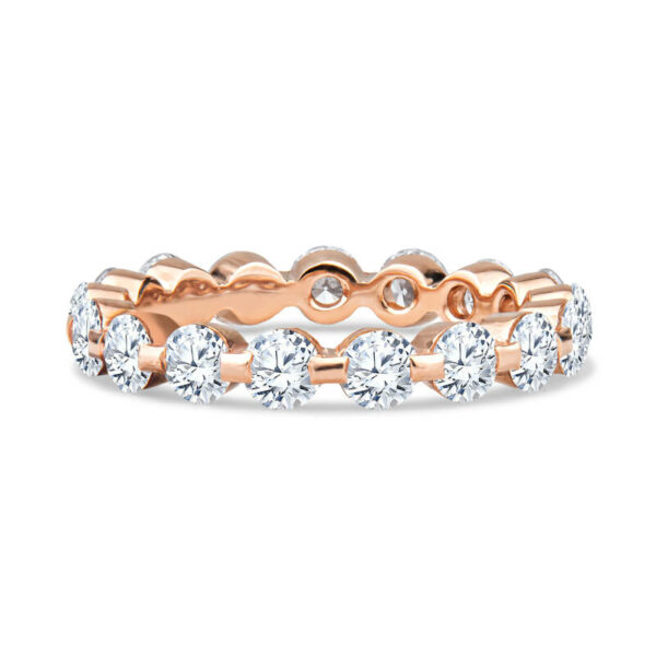 a rose gold ring with five round diamonds