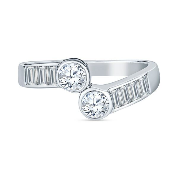 a white gold ring with three baguettes and two diamonds