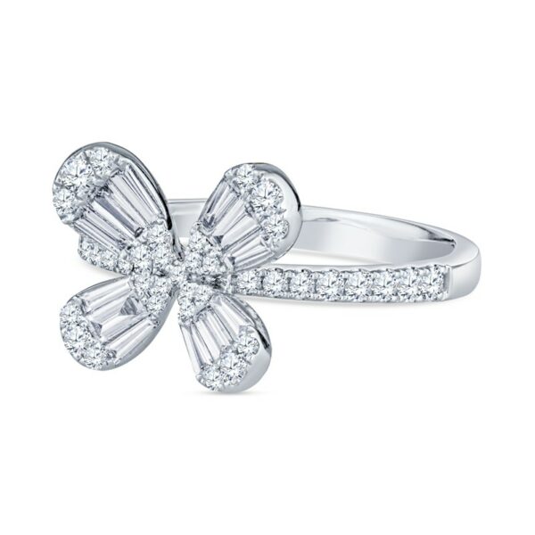 a white gold ring with a flower shaped diamond