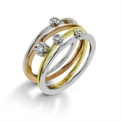 three tone gold and silver ring with diamonds