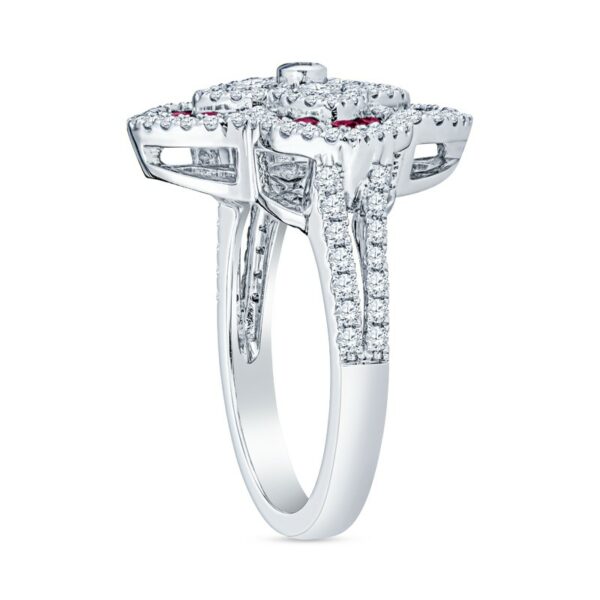 a white gold ring with two red and white diamonds