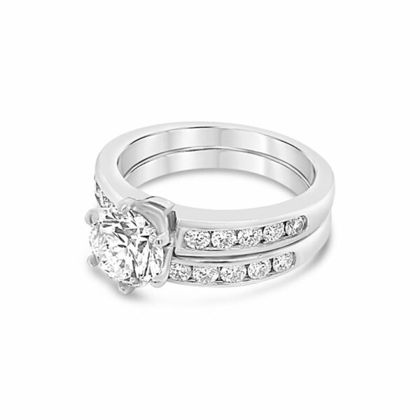 a diamond engagement ring set with channeled diamonds
