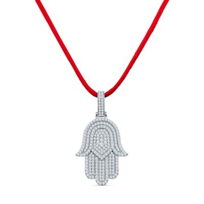 a necklace with a hamsa on it