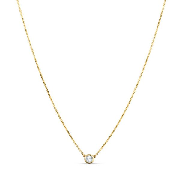 a gold necklace with a single diamond
