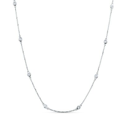 a long necklace with white diamonds on it