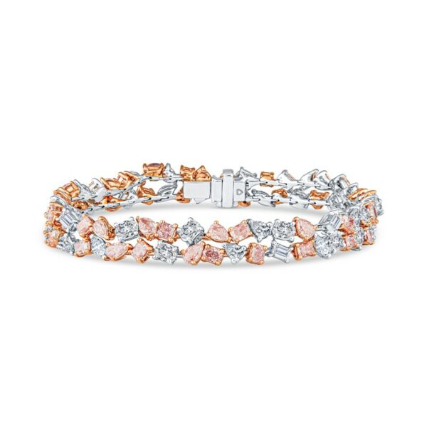 a bracelet with two tone gold and white diamonds