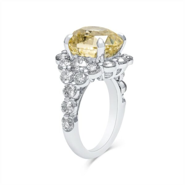 a fancy yellow diamond ring with white diamonds