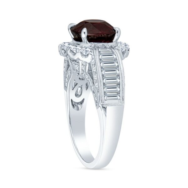a white gold ring with a brown diamond and baguetts