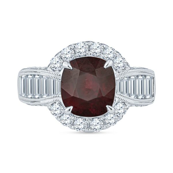 a ring with a large red stone surrounded by white diamonds
