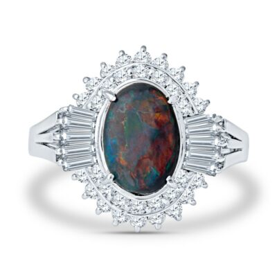 a ring with an oval opal surrounded by baguettes