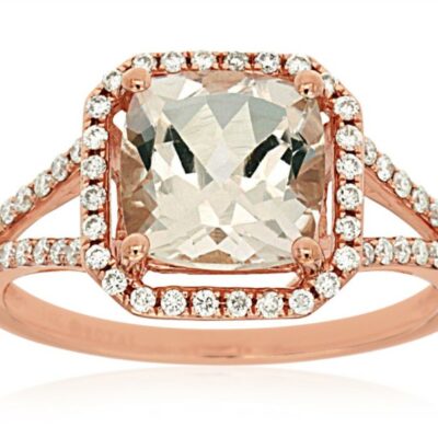 an engagement ring with a cushion cut diamond