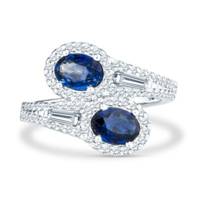 two blue sapphire and diamond rings on a white background