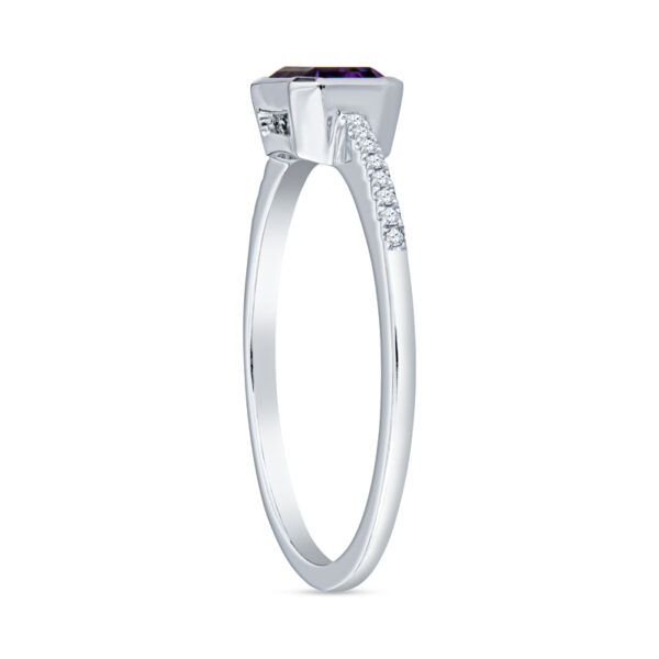 a white gold ring with an amethorate and diamonds