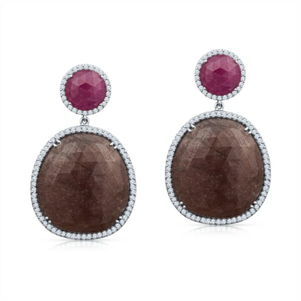 a pair of earrings with brown and pink stones