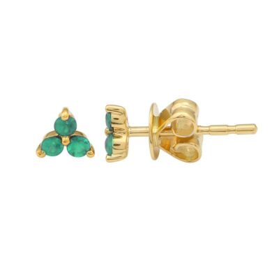 a pair of gold earrings with green stones
