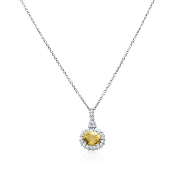 a yellow and white diamond pendant on a chain