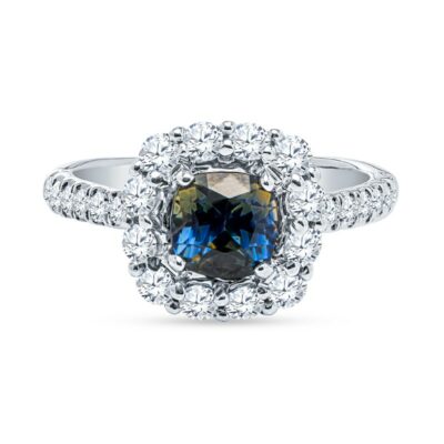 a blue diamond ring with diamonds around it