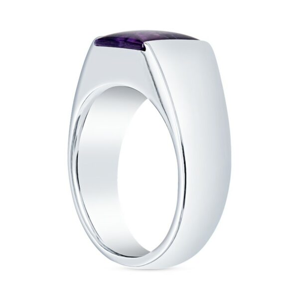 a ring with a purple stone in the middle