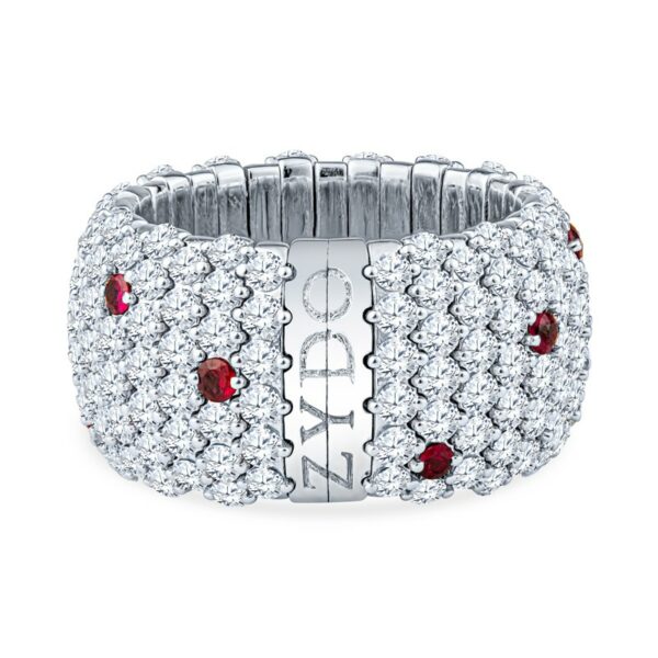 a white gold ring with red and white stones