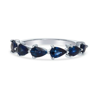 a ring with three triangular shaped blue stones