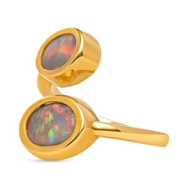 a pair of gold cufflinkes with an opal inlay