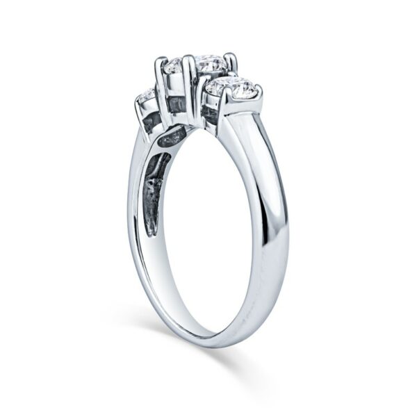 three stone engagement ring with diamonds on the sides
