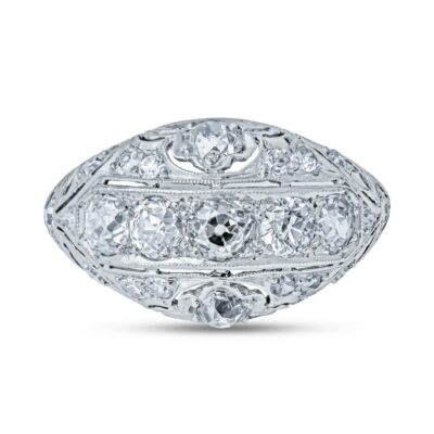 an antique style diamond ring on a white background