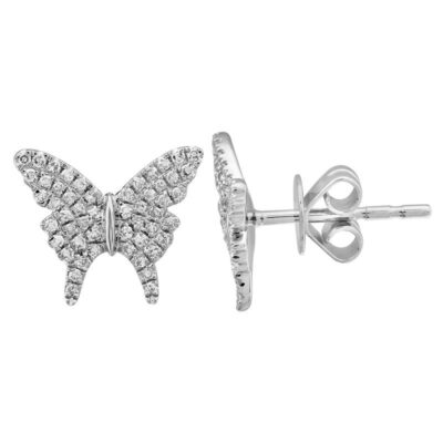 a pair of diamond earrings in white gold