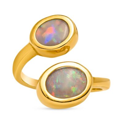 two gold rings with white opal in them